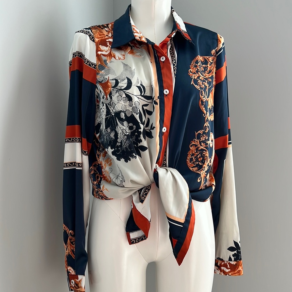 Fashion Nova. Printed blouse. Tunic length. Size medium.